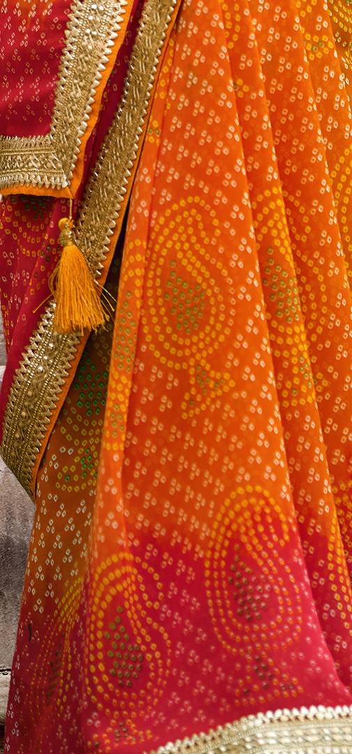 Women's Orange Georgette Bandhani Prints Saree with blouse piece